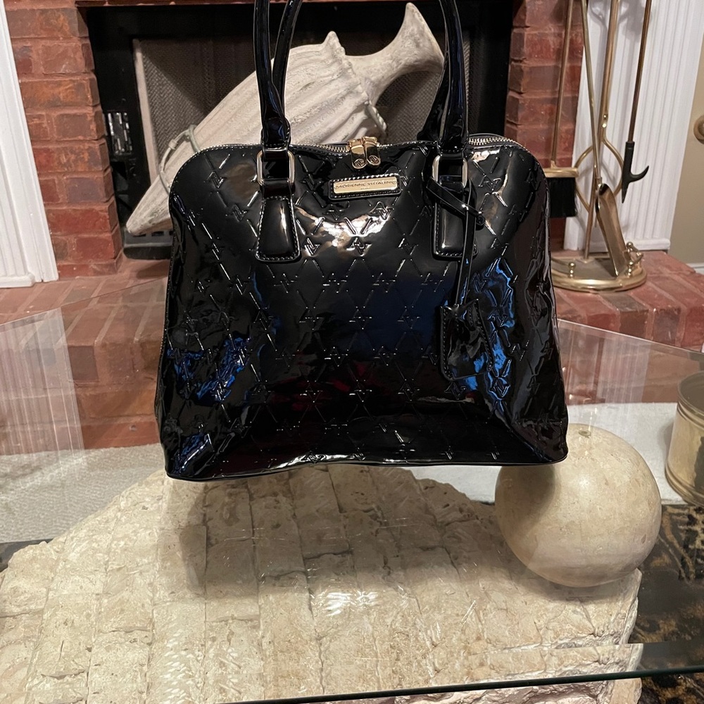 Andrienne Vittadini black faux patent leather bag.